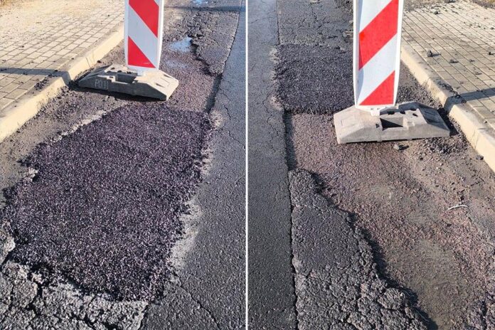łatają dziury w drodze